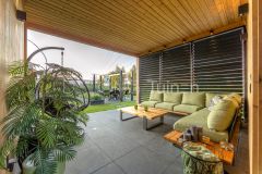 Overkapping in designtuin in Sliedrecht