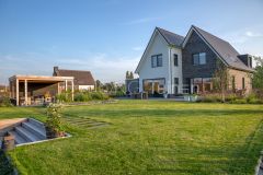 Vrijstaande woning met een mooi gazonveld in Papendrecht