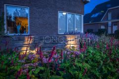 Moderne tuin met een design wand in Papendrecht