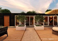 Sfeervolle tuin met een grote overkapping in Sliedrecht