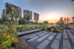 Tuinaanleg met staptegels in grind