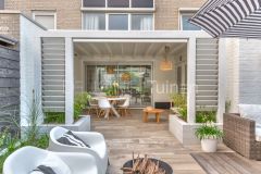 Ibiza style tuin Papendrecht met shutters