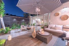 Ibiza style tuin Papendrecht zithoek avond