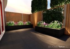 Verhoogde plantenbakken met hortensia's bij bedrijfstuin