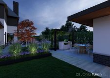 Pergola's over buitenkeuken in de avond
