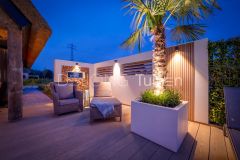 Design wand in Ibiza tuin
